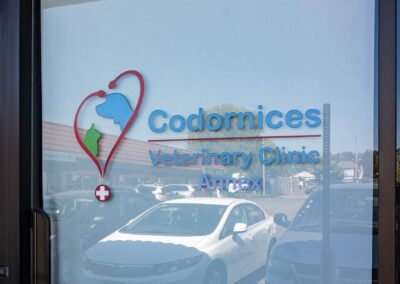 Codornices Veterinary Clinic hospital name on glass door